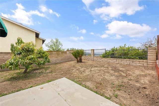 1945 Cumberland Dr, West Covina, CA 91792 - fenced backyard featuring a patio area