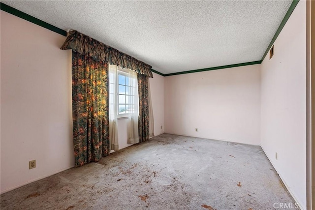 1945 Cumberland Dr, West Covina, CA 91792 - carpeted empty room with a textured ceiling and crown molding