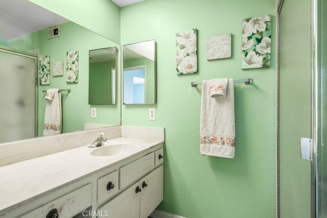 4734 E Tanglewood Ave, Anaheim, CA 92807 - full bath with vanity, a shower stall, and baseboards