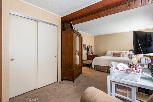 4734 E Tanglewood Ave, Anaheim, CA 92807 - carpeted bedroom featuring a closet, ornamental molding, and a textured ceiling
