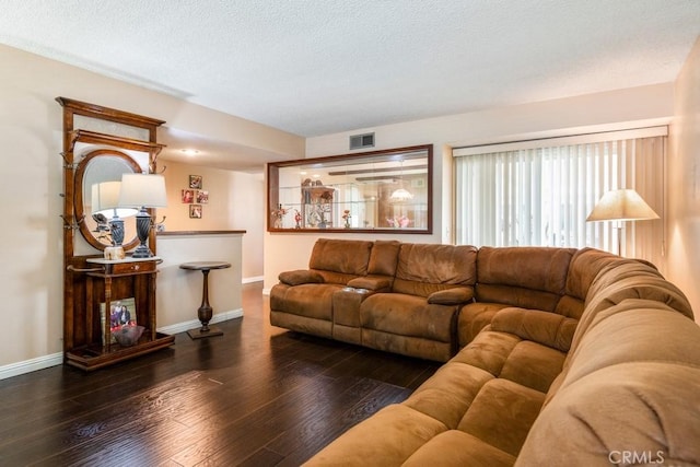 4734 E Tanglewood Ave, Anaheim, CA 92807 - living area featuring baseboards, wood-type flooring, and a textured ceiling