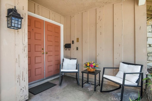 4734 E Tanglewood Ave, Anaheim, CA 92807 - doorway to property featuring board and batten siding
