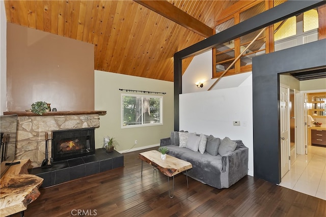 27476 School Rd, Lake Arrowhead, CA 92326 - living area with high vaulted ceiling, a tile fireplace, wood-type flooring, baseboards, and wooden ceiling