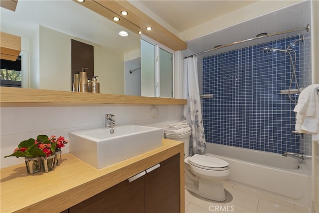 27476 School Rd, Lake Arrowhead, CA 92326 - bathroom with tile patterned flooring, recessed lighting, vanity, shower / bathtub combination with curtain, and toilet