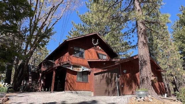 33477 Fern Dr, Green Valley Lake, CA 92341 - view of side of property with stairs and driveway