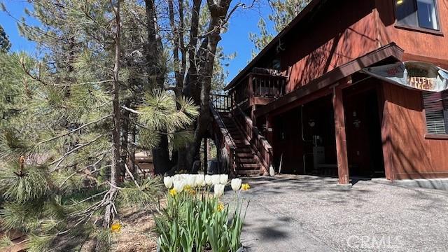 33477 Fern Dr, Green Valley Lake, CA 92341 - view of side of home with stairway
