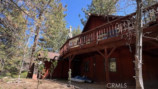 33477 Fern Dr, Green Valley Lake, CA 92341 - back of house featuring a deck