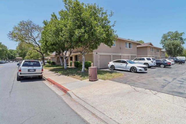 951 Amistad Ct Unit C, El Cajon, CA 92019 - view of front of house featuring stucco siding and a residential view
