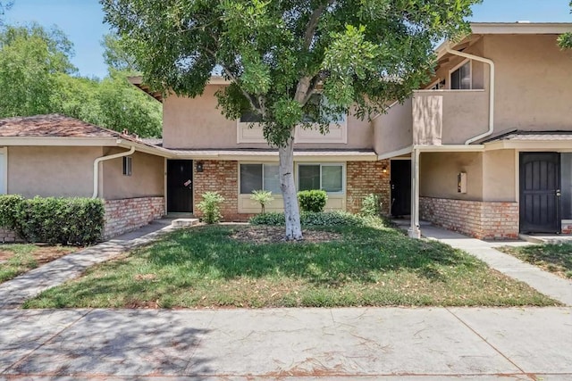 951 Amistad Ct Unit C, El Cajon, CA 92019 - multi unit property featuring stucco siding, brick siding, and a front lawn
