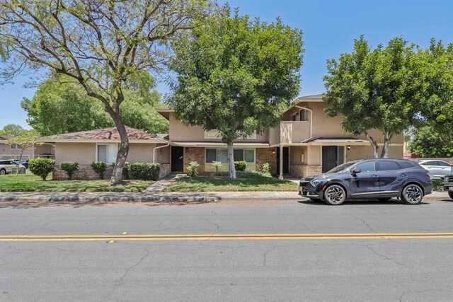 951 Amistad Ct Unit C, El Cajon, CA 92019 - view of front of property featuring stucco siding