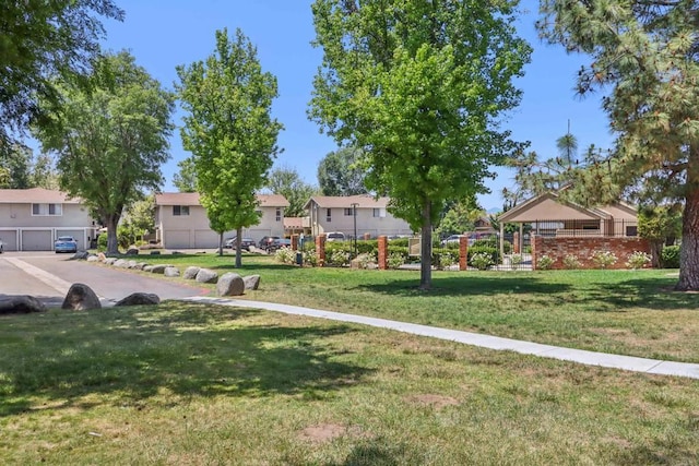 951 Amistad Ct Unit C, El Cajon, CA 92019 - view of green lawn featuring a residential view