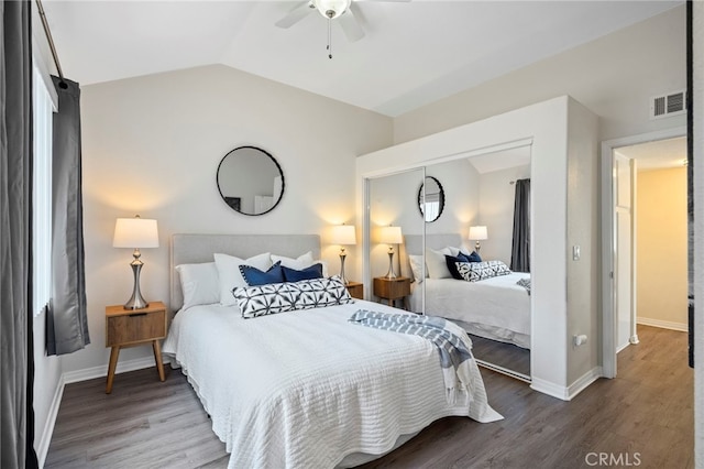 28241 Sorrento Unit 124, Laguna Niguel, CA 92677 - bedroom with lofted ceiling, wood finished floors, baseboards, and a ceiling fan