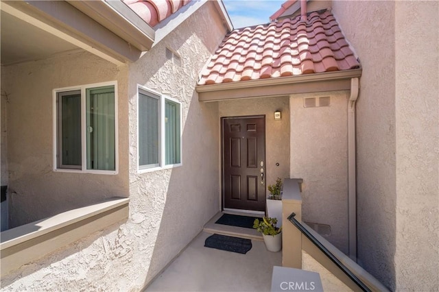 28241 Sorrento Unit 124, Laguna Niguel, CA 92677 - property entrance featuring stucco siding and a tile roof