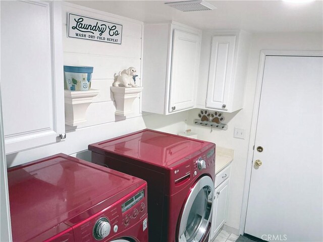 29944 Peach Tree Ct, Murrieta, CA 92563 - washroom with washer and clothes dryer and cabinet space