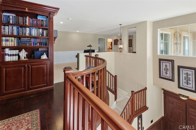 29944 Peach Tree Ct, Murrieta, CA 92563 - hallway featuring an upstairs landing and dark wood-style flooring