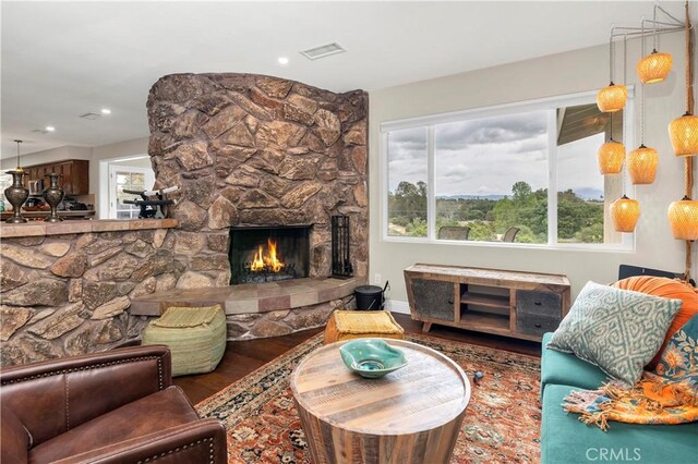 735 Del Valle Dr, Fallbrook, CA 92028 - living room featuring wood finished floors, a fireplace, and recessed lighting