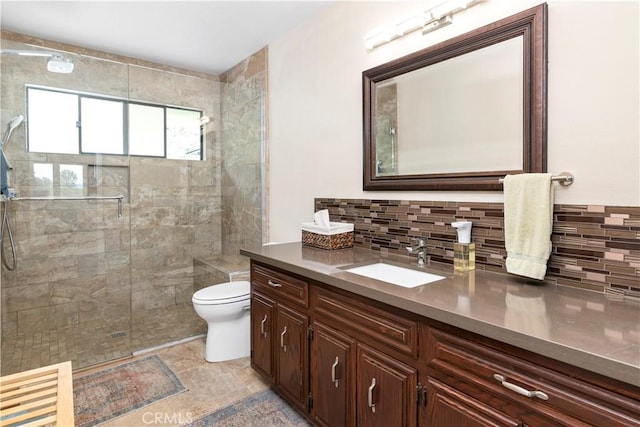 735 Del Valle Dr, Fallbrook, CA 92028 - bathroom with toilet, a stall shower, vanity, and tasteful backsplash