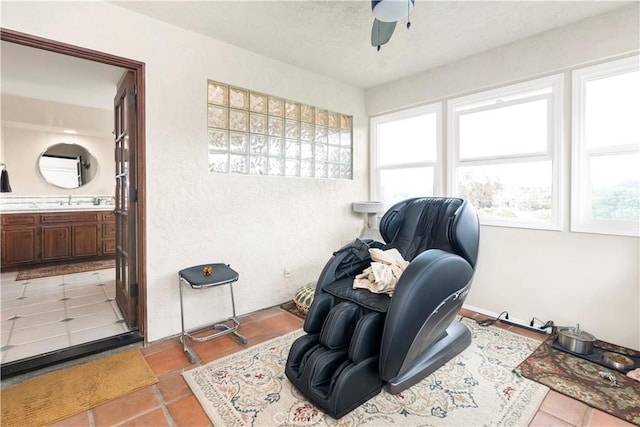 735 Del Valle Dr, Fallbrook, CA 92028 - living area featuring ceiling fan and light tile patterned floors
