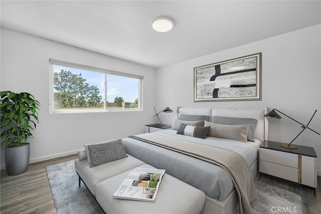 27906 Amber Unit 231, Mission Viejo, CA 92691 - bedroom featuring wood finished floors and baseboards