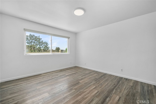 27906 Amber Unit 231, Mission Viejo, CA 92691 - spare room with wood finished floors and baseboards