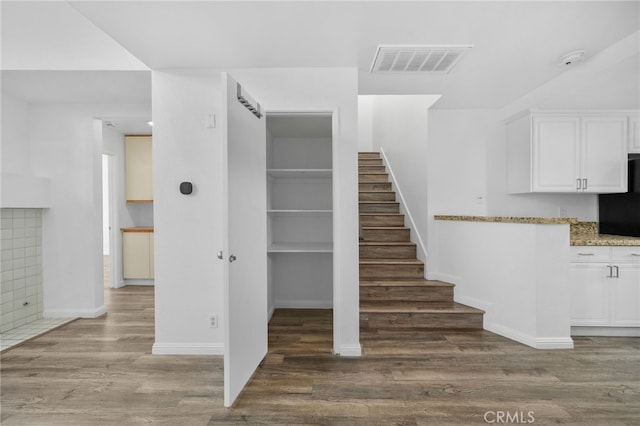 27906 Amber Unit 231, Mission Viejo, CA 92691 - stairs with wood finished floors and baseboards