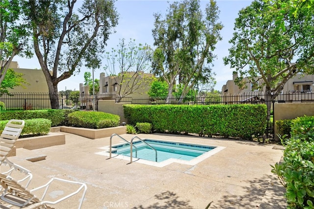 27906 Amber Unit 231, Mission Viejo, CA 92691 - view of pool featuring a community hot tub and a patio