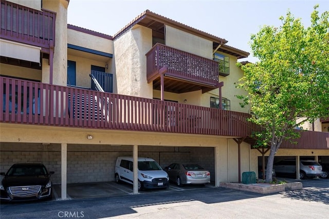 440 W Citracado Unit 19, Escondido, CA 92025 - view of building exterior featuring covered parking