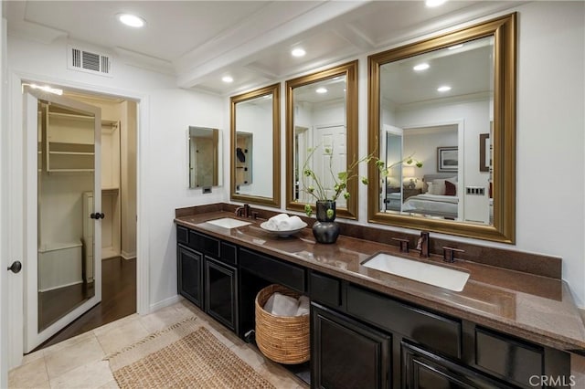 14 Saint Pierre, Newport Coast, CA 92657 - ensuite bathroom featuring double vanity, ornamental molding, and recessed lighting