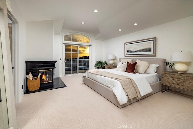 14 Saint Pierre, Newport Coast, CA 92657 - carpeted bedroom with recessed lighting, access to exterior, and a glass covered fireplace