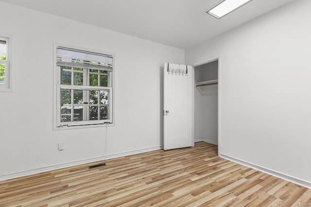 3120 Curtis St, San Diego, CA 92106 - unfurnished bedroom with light wood finished floors, baseboards, and a closet