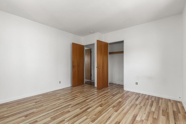 3120 Curtis St, San Diego, CA 92106 - unfurnished bedroom featuring light wood finished floors, baseboards, and a closet