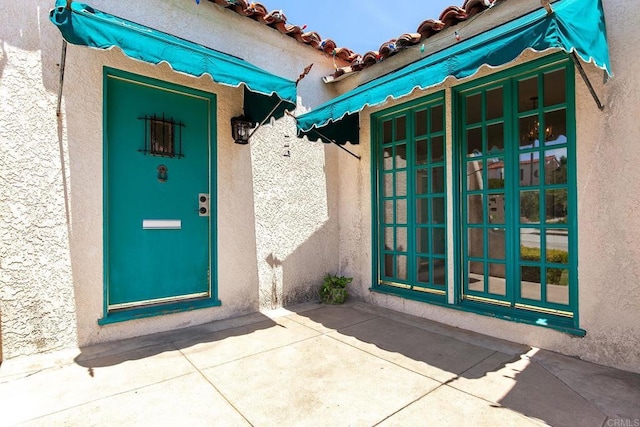 3120 Curtis St, San Diego, CA 92106 - property entrance featuring stucco siding and french doors