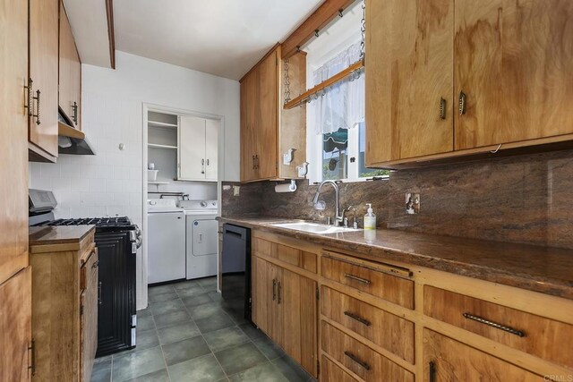 3120 Curtis St, San Diego, CA 92106 - kitchen featuring washer and dryer, a sink, range with gas cooktop, black dishwasher, and backsplash