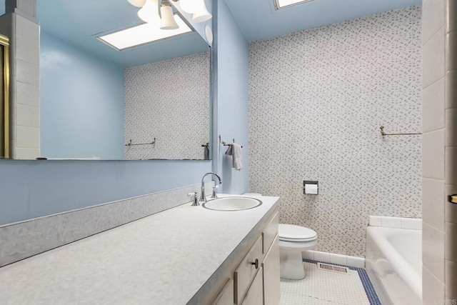 3120 Curtis St, San Diego, CA 92106 - bathroom featuring toilet, tile patterned flooring, vanity, and wallpapered walls