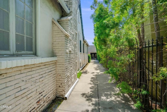 1120 S Burnside Ave, Los Angeles, CA 90019 - view of property exterior with brick siding