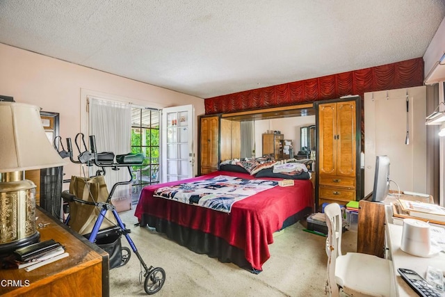 1120 S Burnside Ave, Los Angeles, CA 90019 - carpeted bedroom with a textured ceiling