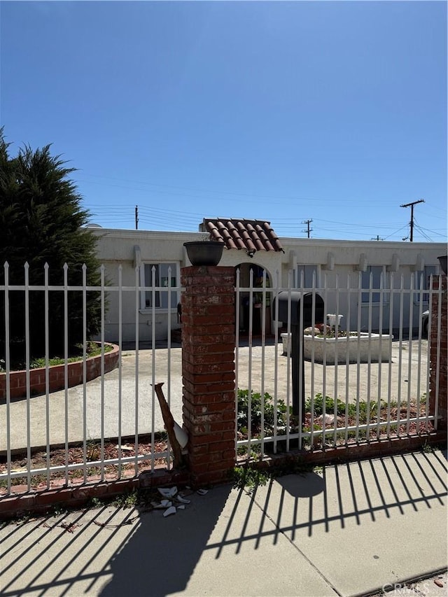 12406 Haley St, Sun Valley, CA 91352 - view of patio / terrace featuring a gate