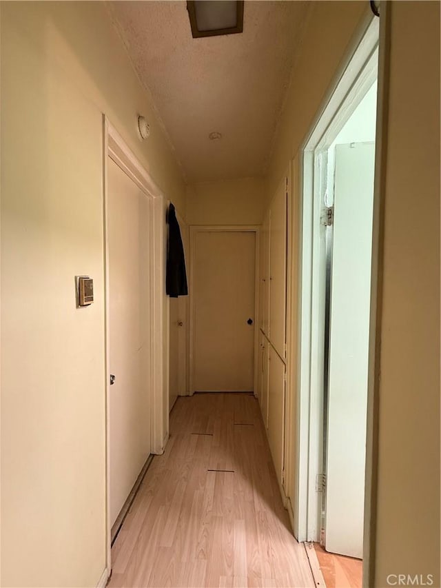 12406 Haley St, Sun Valley, CA 91352 - corridor with light wood finished floors