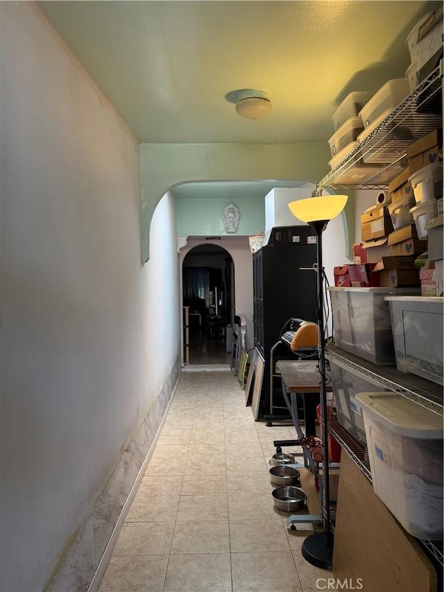 12406 Haley St, Sun Valley, CA 91352 - hall featuring arched walkways and tile patterned floors