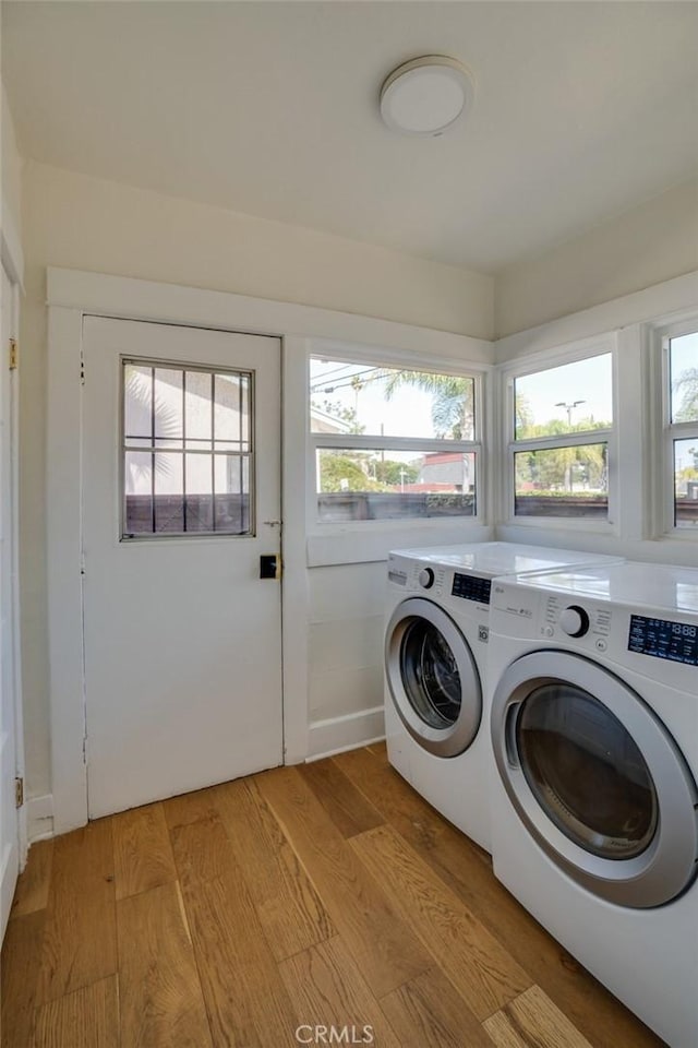3716 Rosemead Ave, Los Angeles, CA 90032 - washroom featuring washing machine and dryer and light wood-style floors