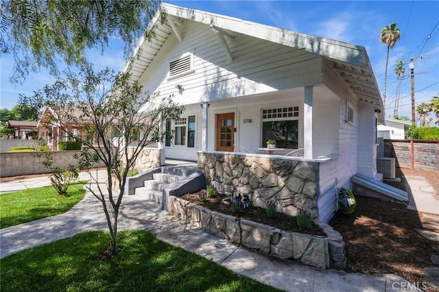 3716 Rosemead Ave, Los Angeles, CA 90032 - bungalow-style home featuring stone siding and a porch