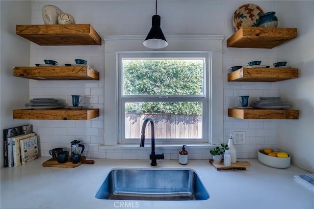 3716 Rosemead Ave, Los Angeles, CA 90032 - kitchen featuring a sink, backsplash, and open shelves