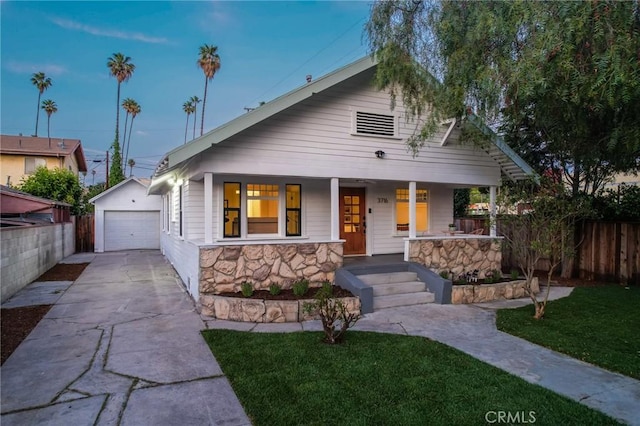 3716 Rosemead Ave, Los Angeles, CA 90032 - view of front facade with a detached garage, a porch, driveway, and an outdoor structure
