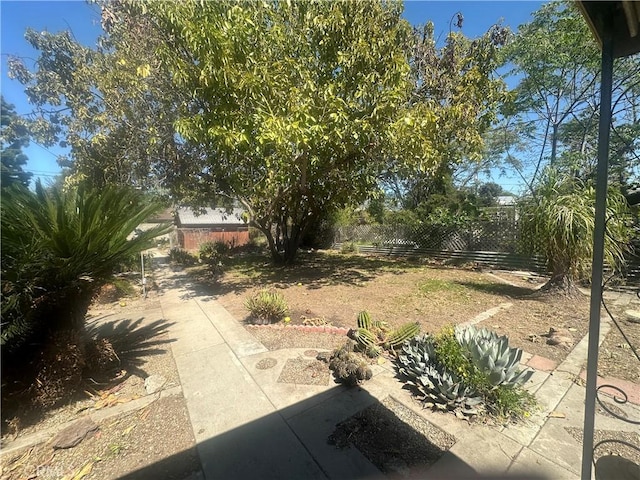 863 S Vanhorn Ave N, West Covina, CA 91790 - fenced backyard with a patio area