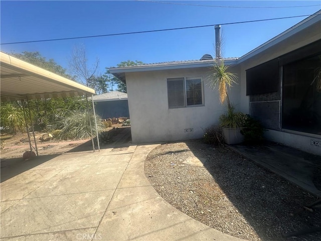 863 S Vanhorn Ave N, West Covina, CA 91790 - view of property exterior with a patio and stucco siding