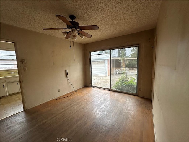 863 S Vanhorn Ave N, West Covina, CA 91790 - spare room featuring a textured ceiling, wood finished floors, and ceiling fan