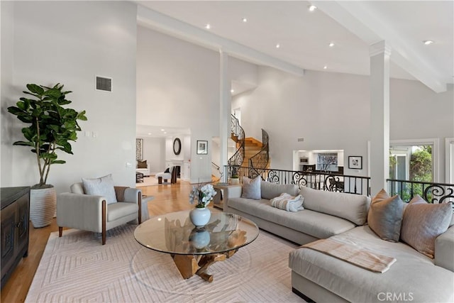 2567 Oakshore, Westlake Village, CA 91361 - living room with high vaulted ceiling, beamed ceiling, wood finished floors, and recessed lighting