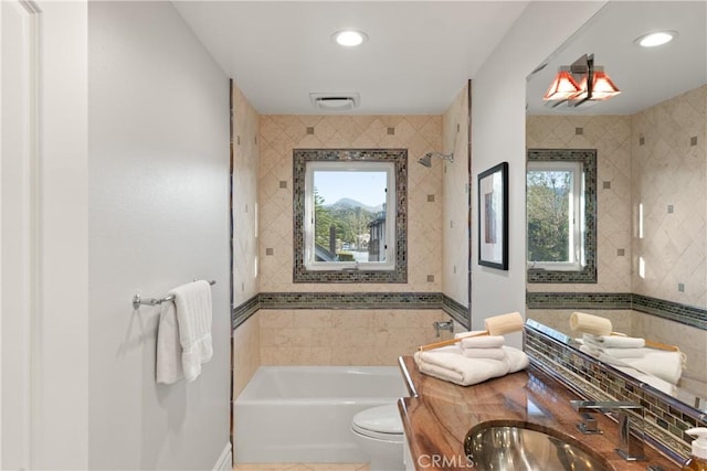2567 Oakshore, Westlake Village, CA 91361 - full bathroom with toilet, a tub to relax in, recessed lighting, vanity, and baseboards