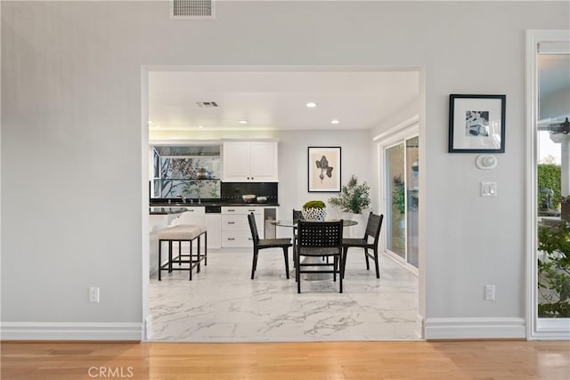 2567 Oakshore, Westlake Village, CA 91361 - dining space featuring baseboards, recessed lighting, and light marble finish floors