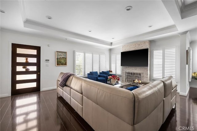 1361 Winchester Ave, Glendale, CA 91201 - living room with a raised ceiling, baseboards, dark wood-type flooring, a fireplace, and crown molding
